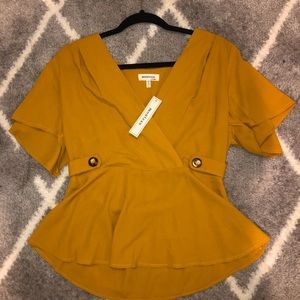 Yellow peplum blouse